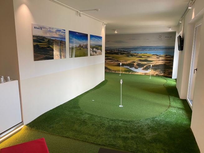Asheville indoor putting green in an office